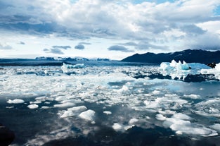 Icebergs float on the water at the Jokulsarlon glacier lagoon.