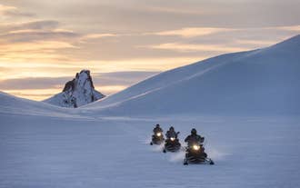 Private West Iceland Waterfalls, Snowmobile and Into the Glacier Ice Cave Tour