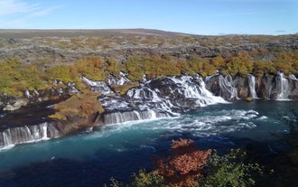 The Hraunafossar waterfall running into a river in West Iceland.