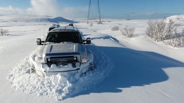 You'll travel in a monster truck equipped to easily travel across snow, rivers, and other challenging terrain during this full-day tour into the Highlands.