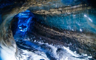 Step inside the secret world of Katla Ice Cave, where ancient ice formations come to life.