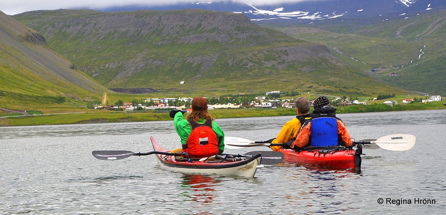 Kayaking by Ísafjörður town in the Westfjords of Iceland Kayaking by Ísafjörður town in the Westfjords of Iceland
