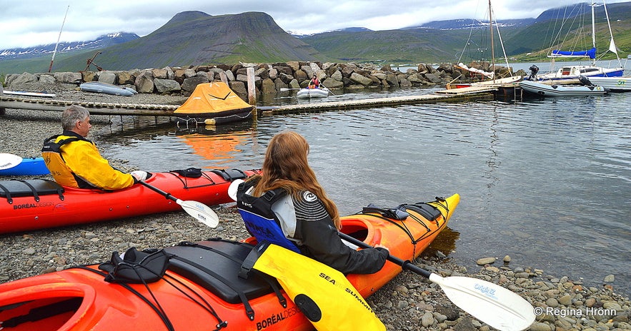 Regína Kayaking by Ísafjörður town in the Westfjords of Iceland