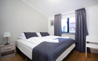 Odinn Reykjavik Eiriksgata Apartments come with comfortable beds.