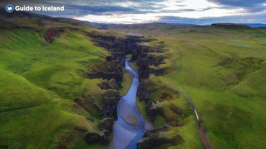 A canyon cuts through the landscape of the Icelandic highlands