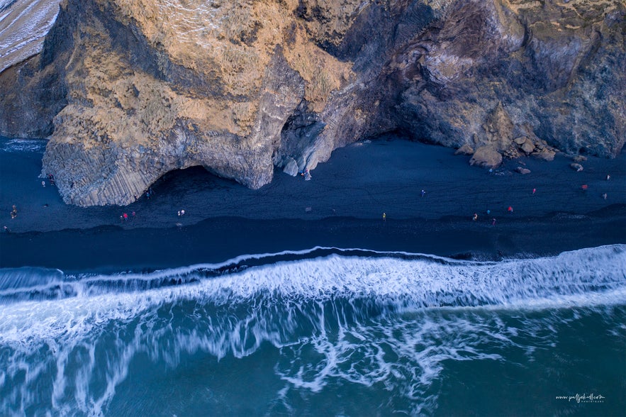 Aerial shot of Reynisfjara beach and the basalt columns.