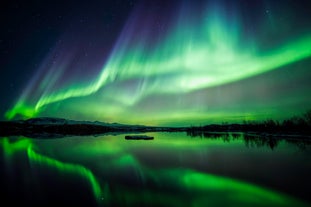 The Northern Lights reflecting in the water