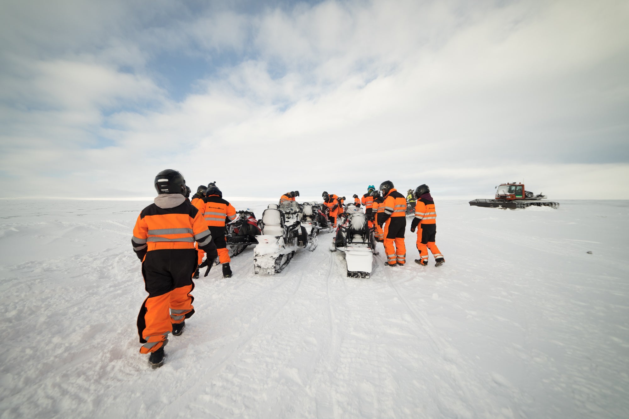 A friendly local guide will teach the basics of operating a snowmobile.