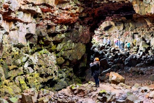 The colorful rock formations inside the Raufarholshellir lava cave are a sight to behold.