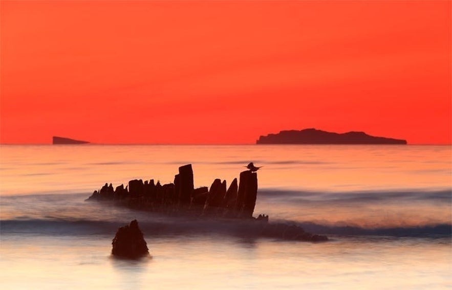 The Ernan shipwreck at sunset in Skagafjordur