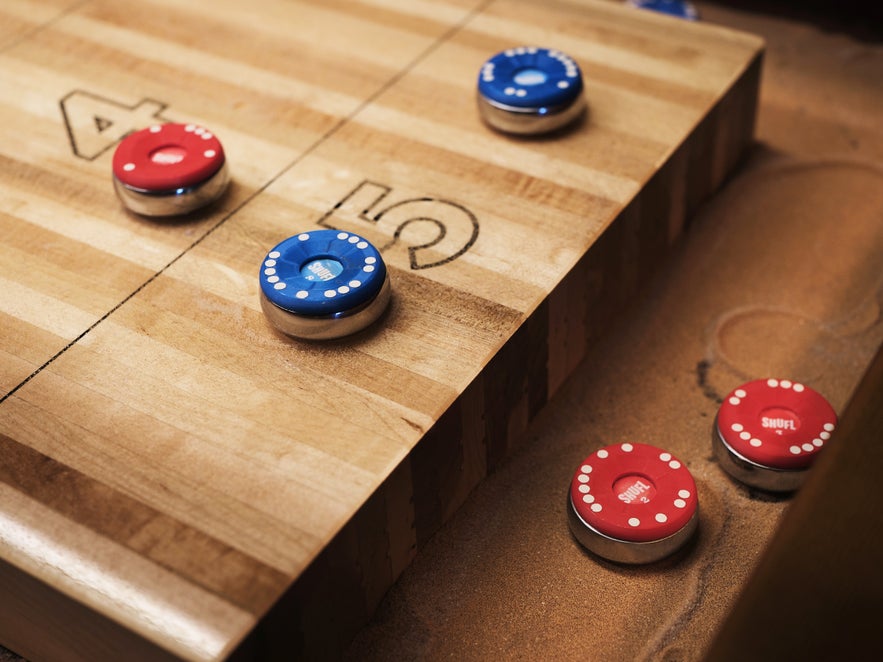 Shuffleboards are a fun time at Oche