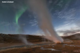 Steam fills the air at the Hverir geothermal area.