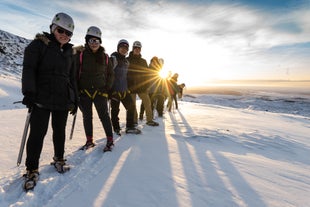 A group of people geared up for a glacier hike in Iceland's Falljokull glacial tongue.