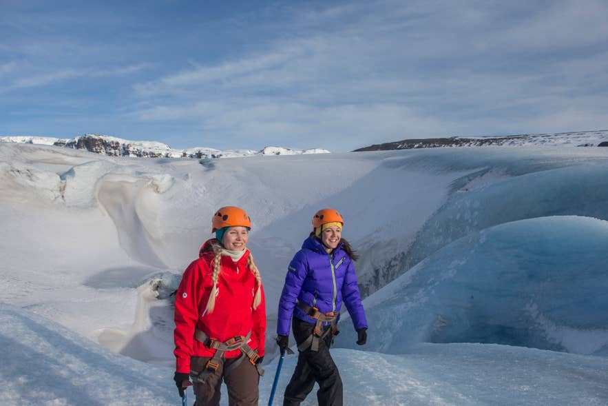 Guide leading a group across a glacier in Iceland Guide leading a group across a glacier in Iceland