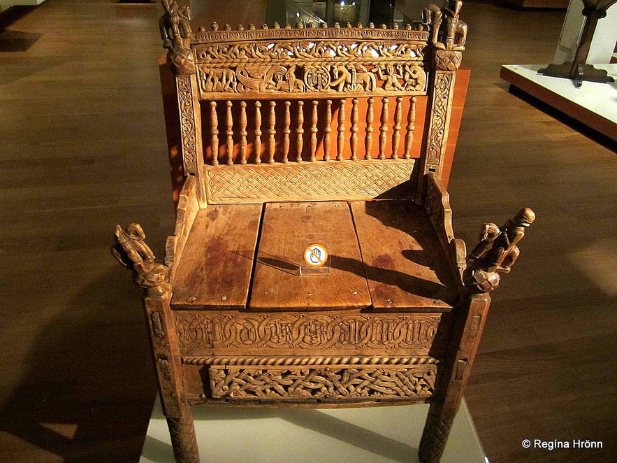 A carved wooden chair from Draflastaðakirkja church now at the National Museum of Iceland