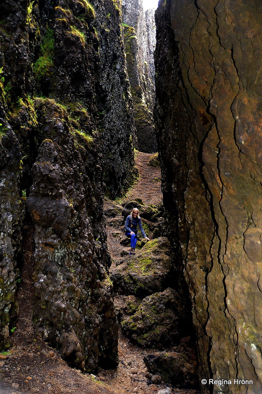 Regína hiking inside Lambafellsklofi rift in SW-Iceland