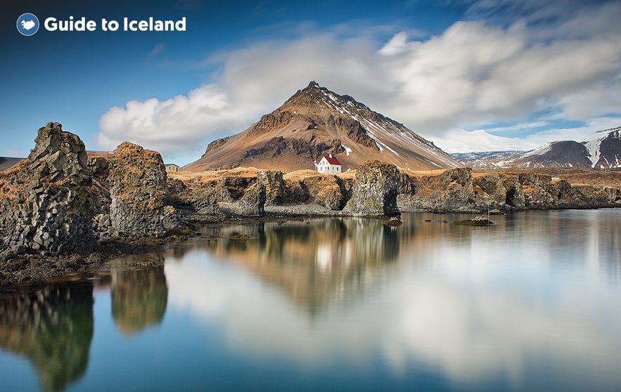 The white house that stands alone in Arnastapi, Iceland.