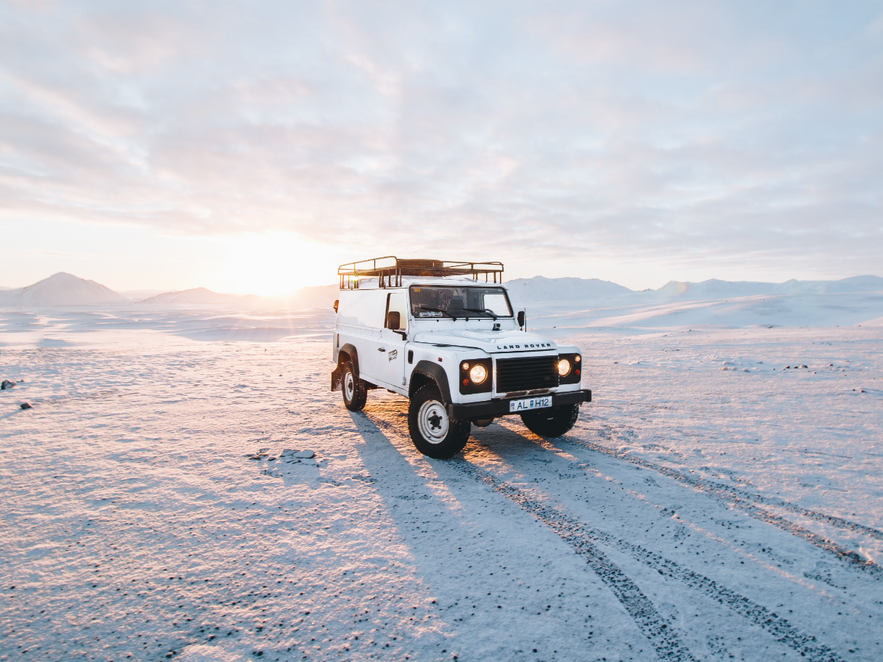 Jeep car driving in Iceland in winter Jeep car driving in Iceland in winter