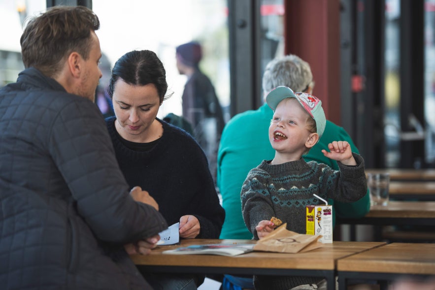 Family enjoying a meal at Hlemmur food hall