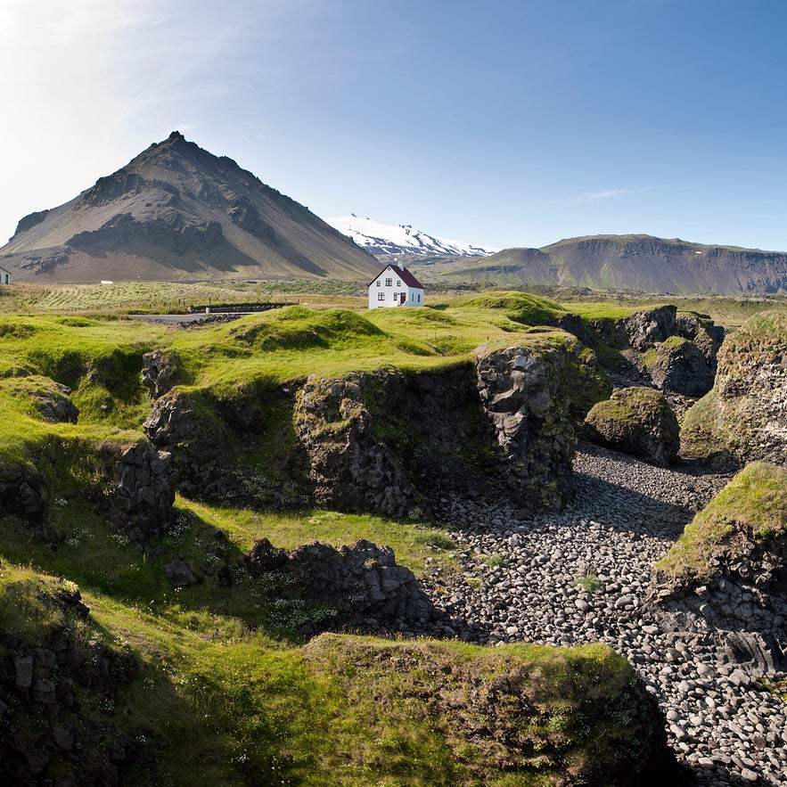 The white house in Arnastapi seen on a summer day.