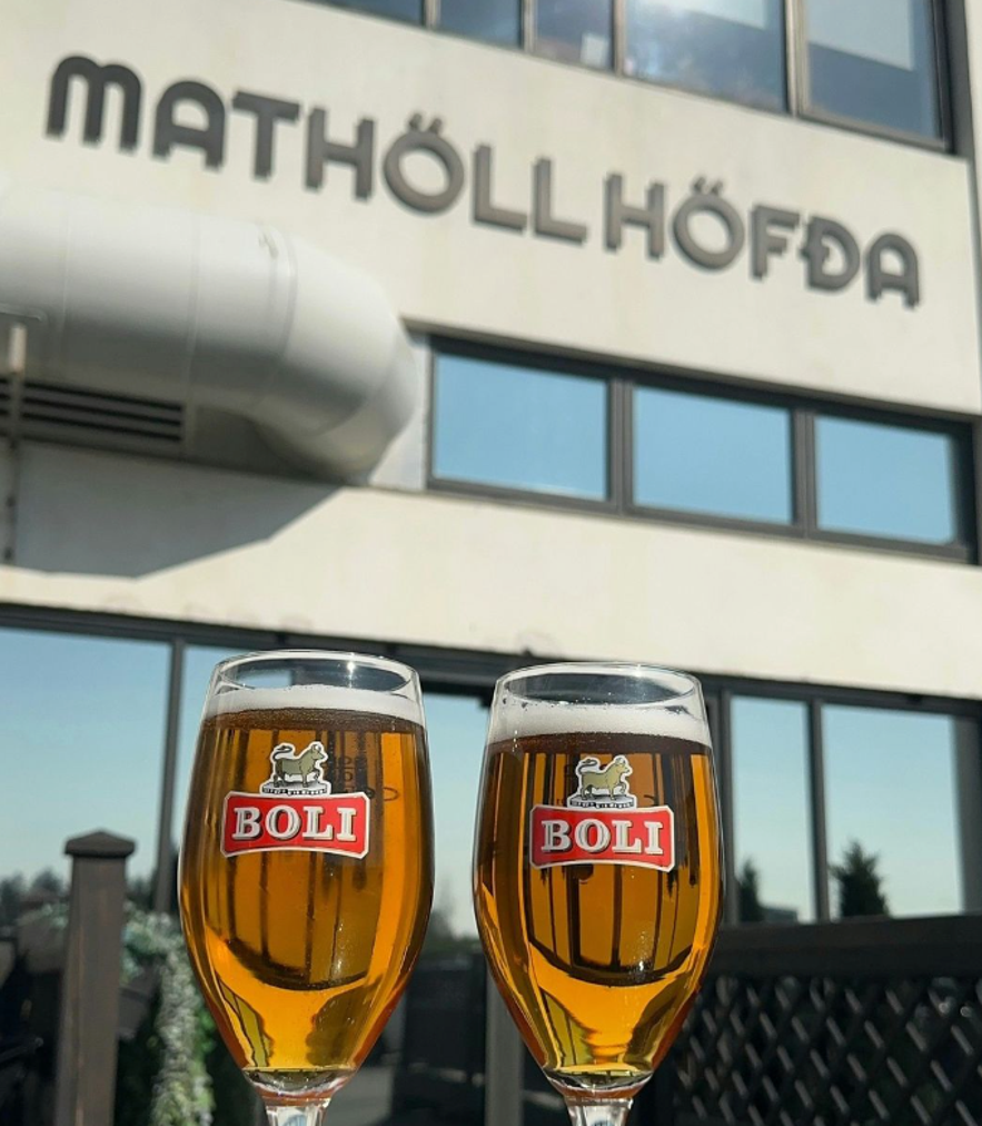 Boli Icelandic beer standing ourside mathollin hofda