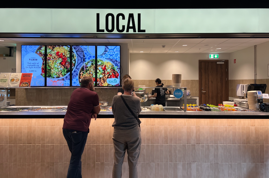 girls being served at Local Salad bar in Kumen food hall