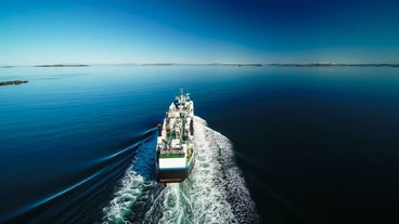 Baldur Ferry sailing in the blue Atlantic Ocean on a summer day.