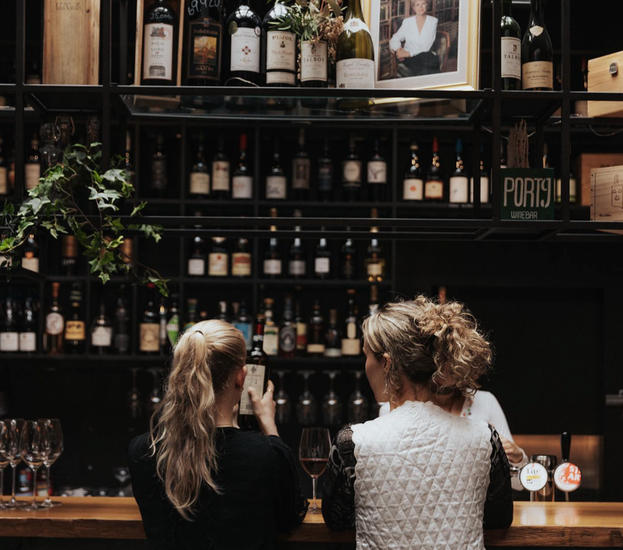 Girls waiting at a bar in Reykjavik downtown