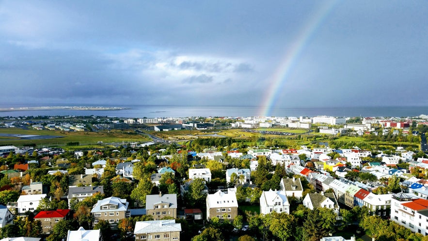 Rainbow over the colorful houses of Reykjavik