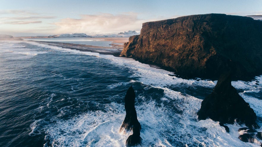 The Reynisfjall mountain towers over the Reynisfjara beach