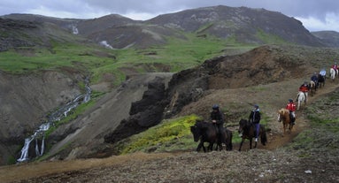 A horseback tour in Iceland allows you to see incredible rivers and scenery.