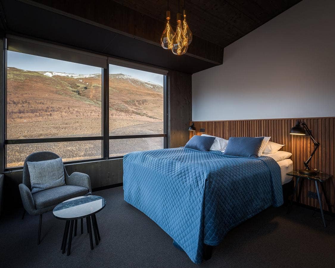A hotel room with a mountain view at Fosshotel Glacier Lagoon.