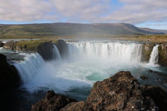 Godafoss waterfall stands about 39 feet high and spans over 98 feet across.