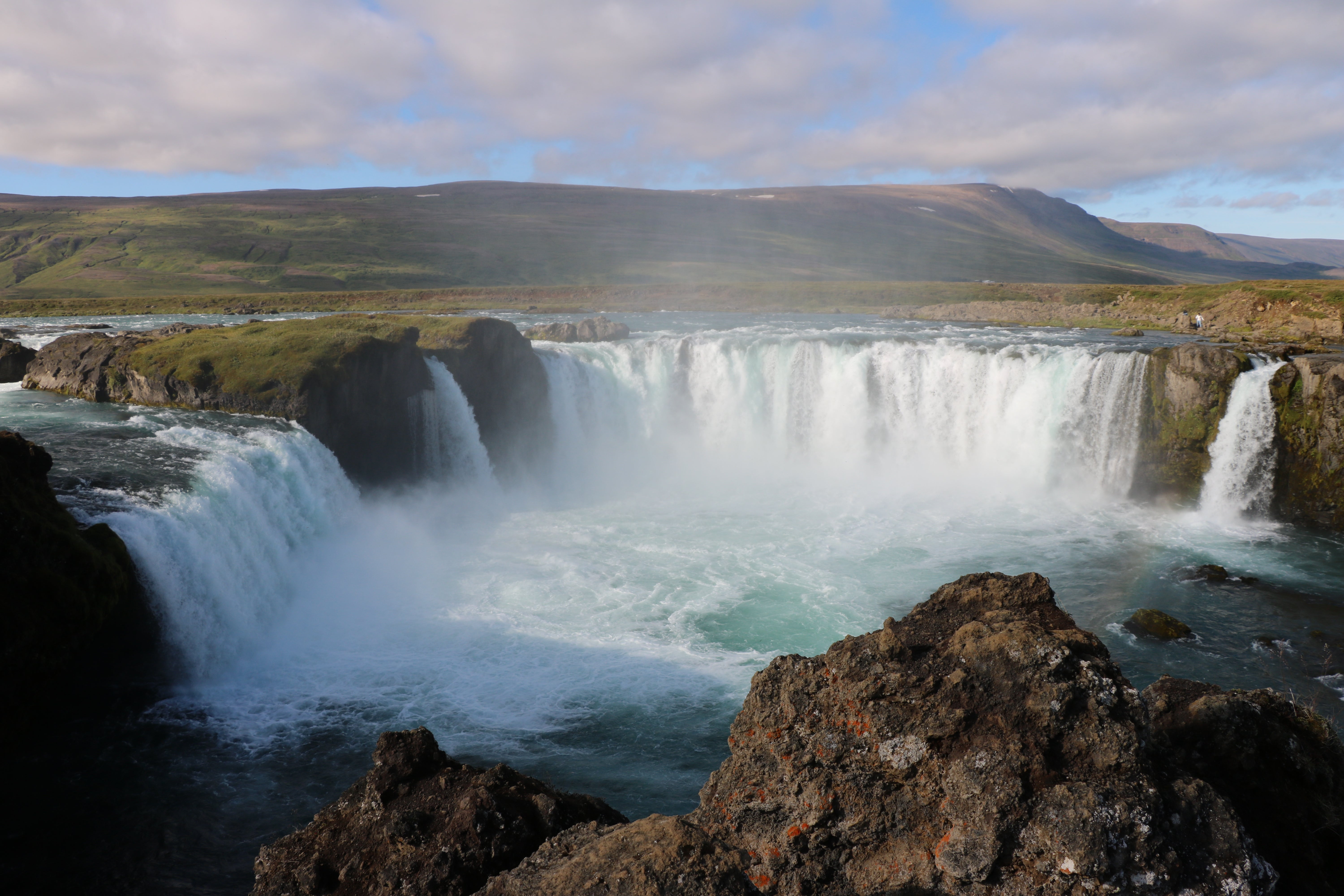 Godafoss waterfall stands about 39 feet high and spans over 98 feet across.
