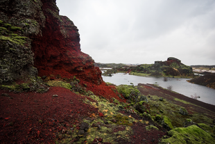 Iceland is full of volcanic fields with red and black colours.