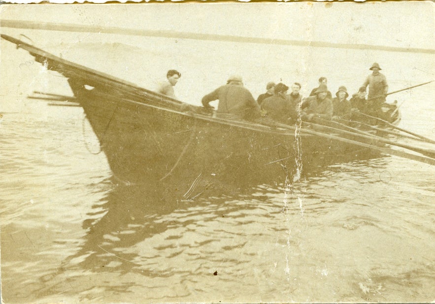 Rowboating fishermen in Iceland during the early 20th century