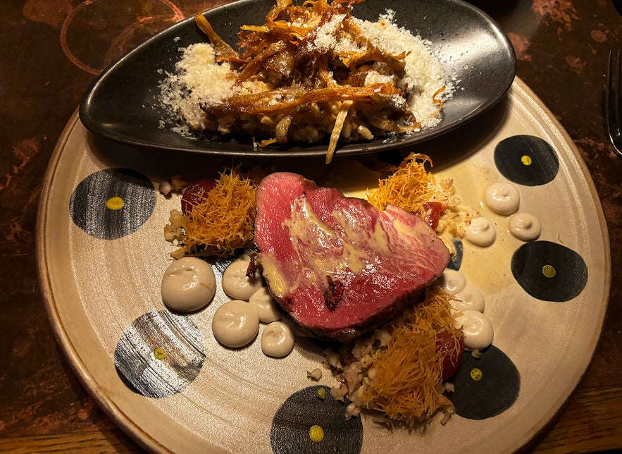 The miso beef tenderloin and wild mushroom risotto at Kol Restaurant