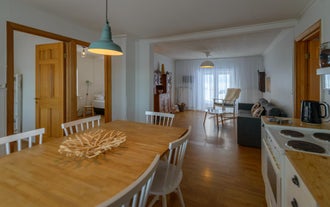 View from the dining table across the open plan living space at Gamla Husid - The Old House.