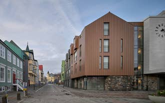 Iceland Parliament Hotel, Curio Collection by Hilton's exterior combines modern and historic architecture.