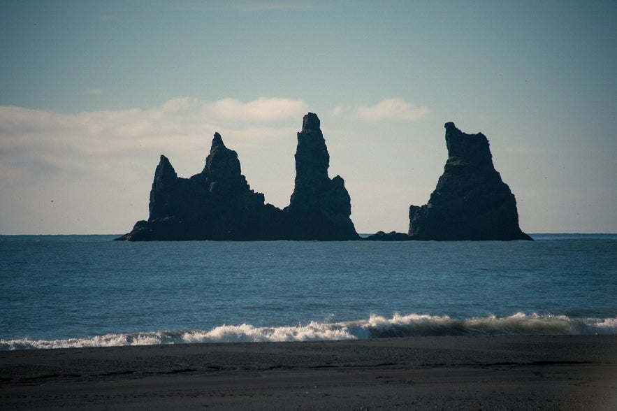 Silhouetted sea stacks at Reynisdrangar, Vík, Iceland