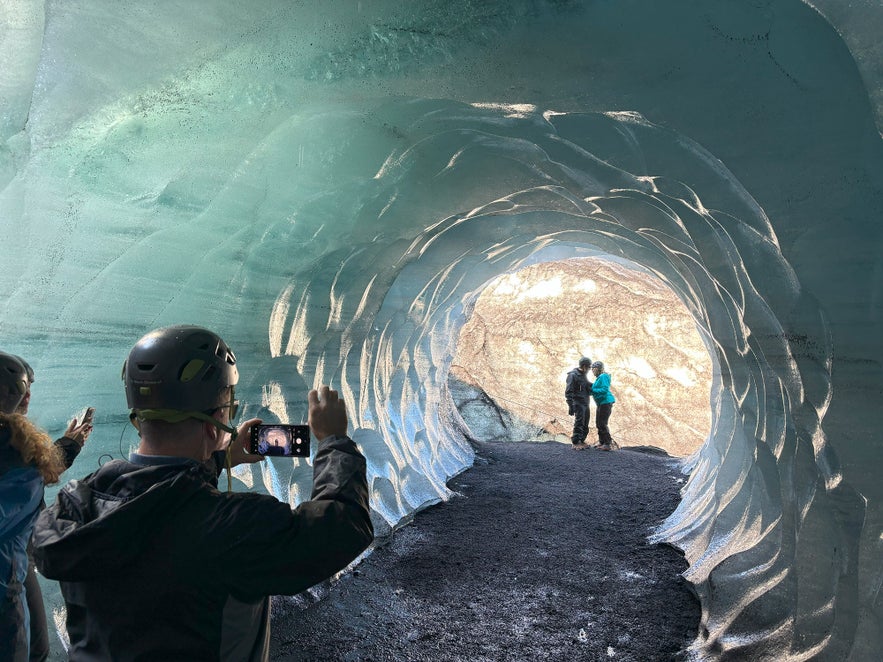 Visitors photographing the Ice Cave Tour