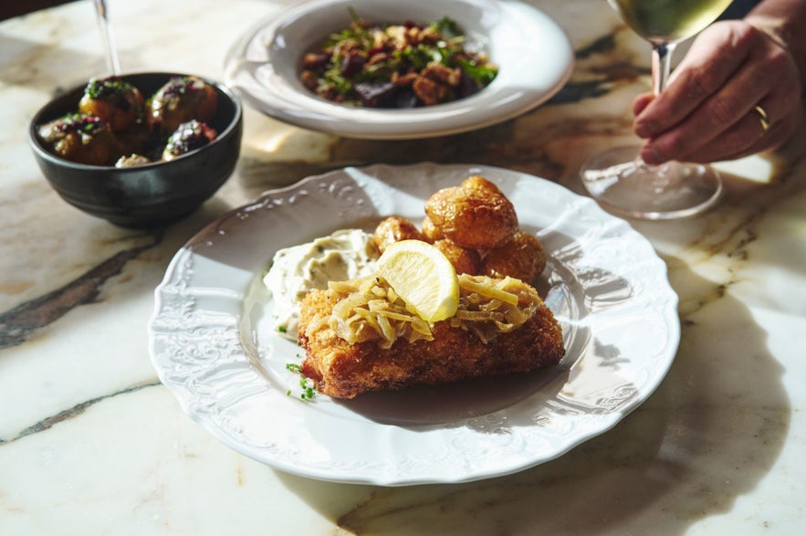 Fried cod with potatoes and lemon at Hresso restaurant in Reykjavik, Iceland