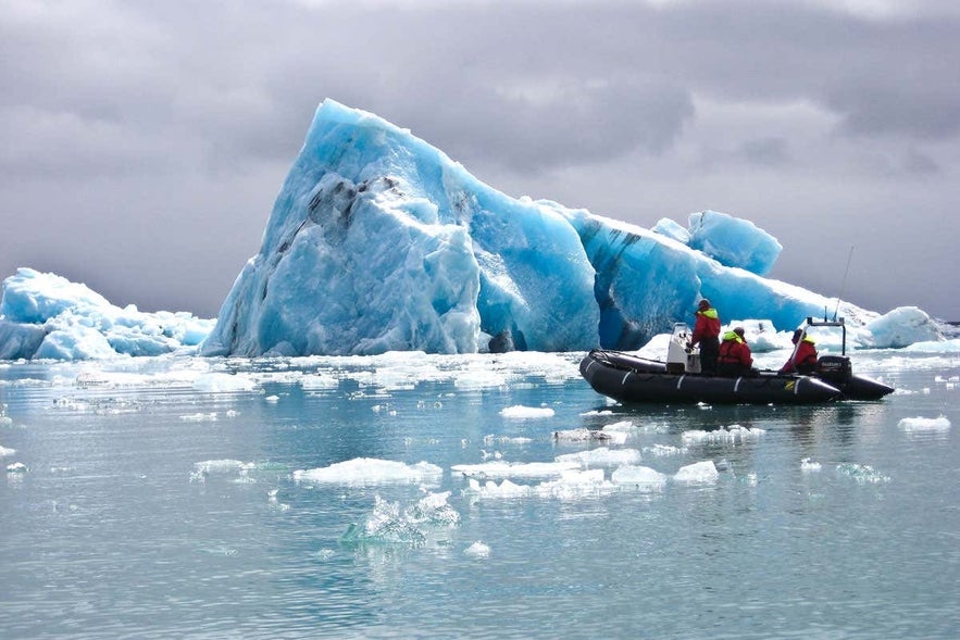 Adventure boat ride at Jökulsárlón Glacier Lagoon near Höfn surrounded by icebergs.