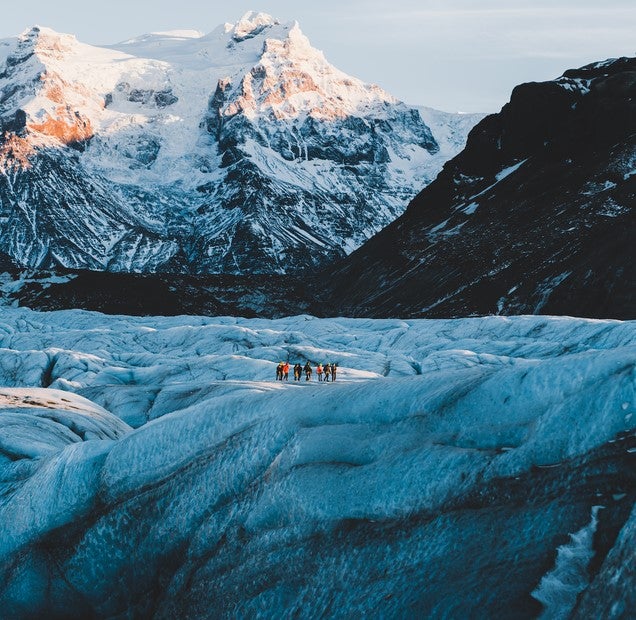 Group hike on Vatnajökull Glacier, a popular adventure near Höfn in southeast Iceland.