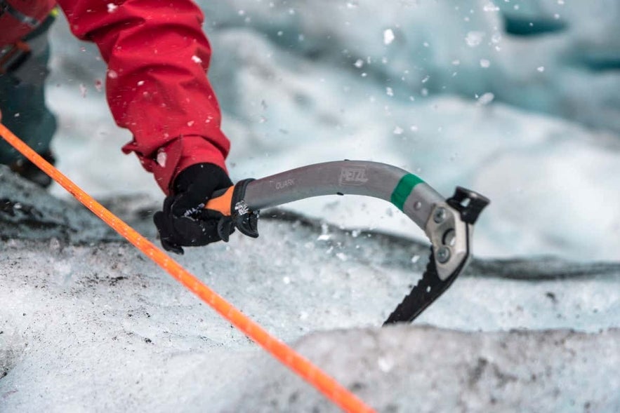 Hiking equipment during an ice-climbing adventure on Vatnajökull Glacier in Iceland.