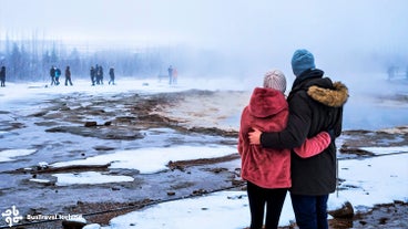 Spectators marvel at the Great Geysir.