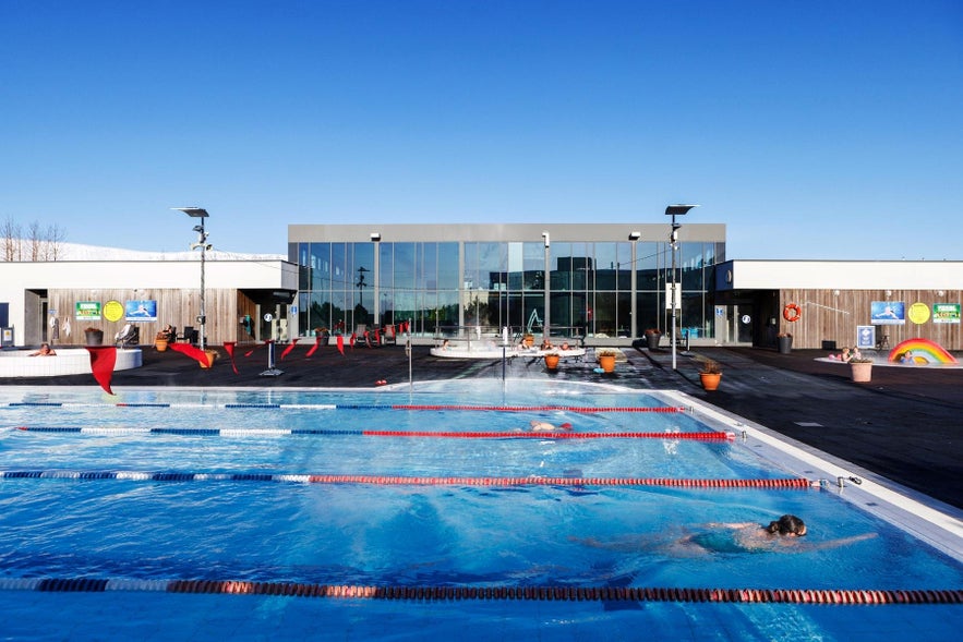 Lagafellslaug in Mosfellsbaer offers outdoor lap lanes, hot tubs, and a modern spa-like design among swimming pools in Reykjavik.