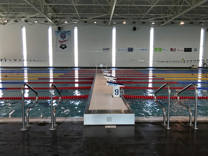 Asvallalaug features a large indoor lap pool with diving blocks, one of the top swimming pools in Reykjavik for serious swimmers.