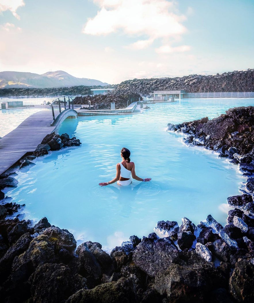 The water of the Blue Lagoon has a milky-blue tone.