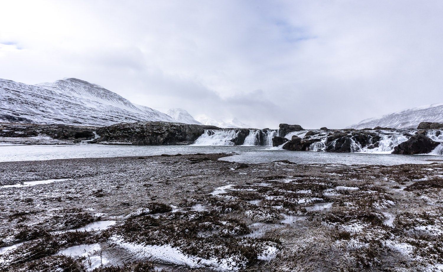 The snow covered terrain of the Breiddalur valley in East Iceland.